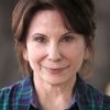 Carolyn Mignini as Gloria Toms