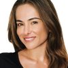 Cássia Linhares as Reporter