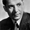 Leo Genn as First Brother Grimm