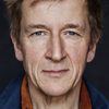 Jens Albinus as S
