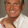 George Hamilton as Phil Singer