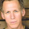 Stephen Spinella as Thomas 'Tom' Tuggiero