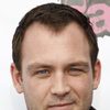 Ty Olsson as Frank Yarley