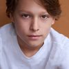 Julian Grey as Finn Stanton