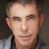 Andrew McIlroy as John