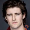 Donncha Tynan as TJ