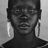 Alek Wek as Miss Millius