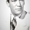 Truman Bradley as Radio Announcer