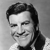 Robert Preston as Roger Morgan