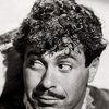Don Diamond as Cafe Proprietor