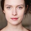 Sarah Swire as Miss Nola