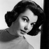 Judy Tyler as Peggy Van Alden