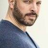 Graham Shiels as Prisoner Romanovich