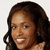 Merrin Dungey as Mrs. Wallace