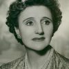 Joyce Carey as Violet Bradman