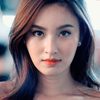 Treechada Petcharat as Thai News Reporter