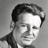 Wallace Ford as Judge Holloway
