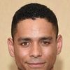 Charlie Barnett as Simon