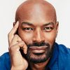 Tyson Beckford as Adrian 'Rude Boy'