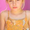 Avery Tiiu Essex as Young Caitlin
