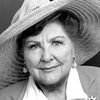 Justine Johnston as Mrs. Puddingforth