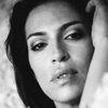 Claudia Ferri as John Oxenberger's Girlfriend