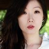 Christina July Kim as Ship Passenger (uncredited)
