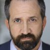Michael Randall as Tortured Mercenary