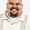 Mike G. as Rudy