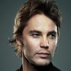 Taylor Kitsch as Kevin Carter