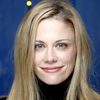 Claire Coffee as Holly Maddox