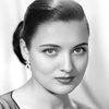 Julie Wilson as Maureen Tate