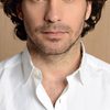Santiago Cabrera as Gene