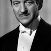 David Niven as Godfrey Smith