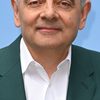 Rowan Atkinson as Mr. Stringer