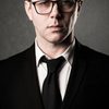 Reece Shearsmith as John Woolf