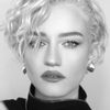 Julia Garner as Justine