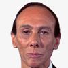 Reggie Nalder as Man at Swap Meet