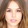 Elise Gatien as Lucy