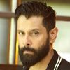 Vikram as Akhilan / Love