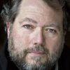 David Broughton-Davies as Ernest Mason