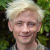 Esben Smed as John 'Faxe' Jensen