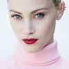 Sarah Gadon as The Woman