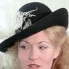Heather Leigh as Mrs. Simpson