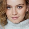 Bella DeLong as Carrie