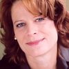 Caryn West as April