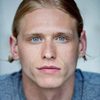 Nicholas Logan as Rhys