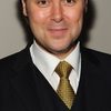 Christian McKay as Banker in Boston