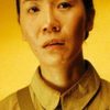 Yang Qing as Maidservant