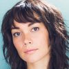 Carrie Kim as Sarah